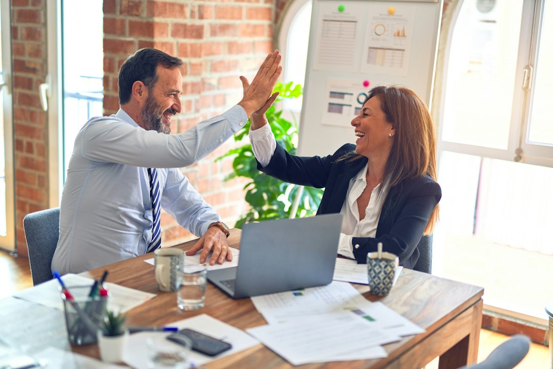Business owners discussing funding options with an advisor